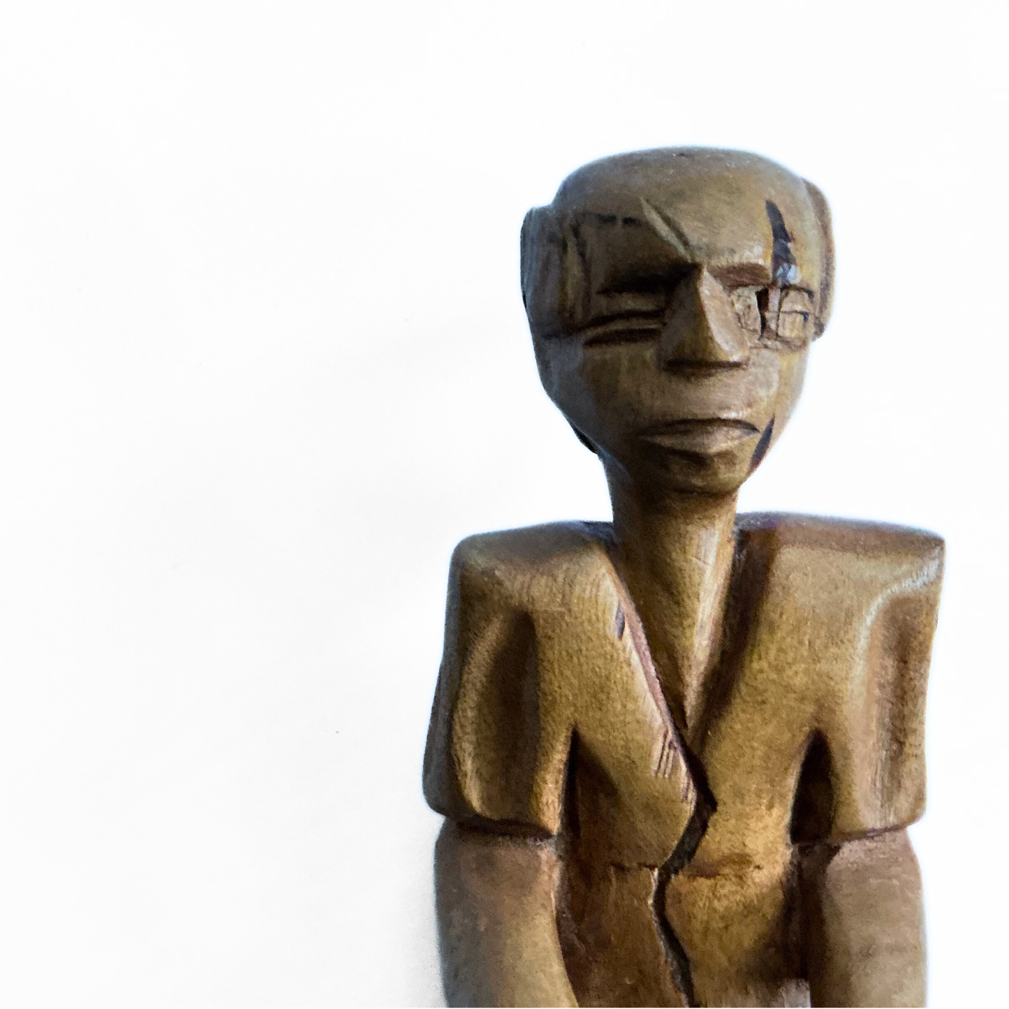 A pair of wooden carved African tribal statue. Drummer and basket carrier.