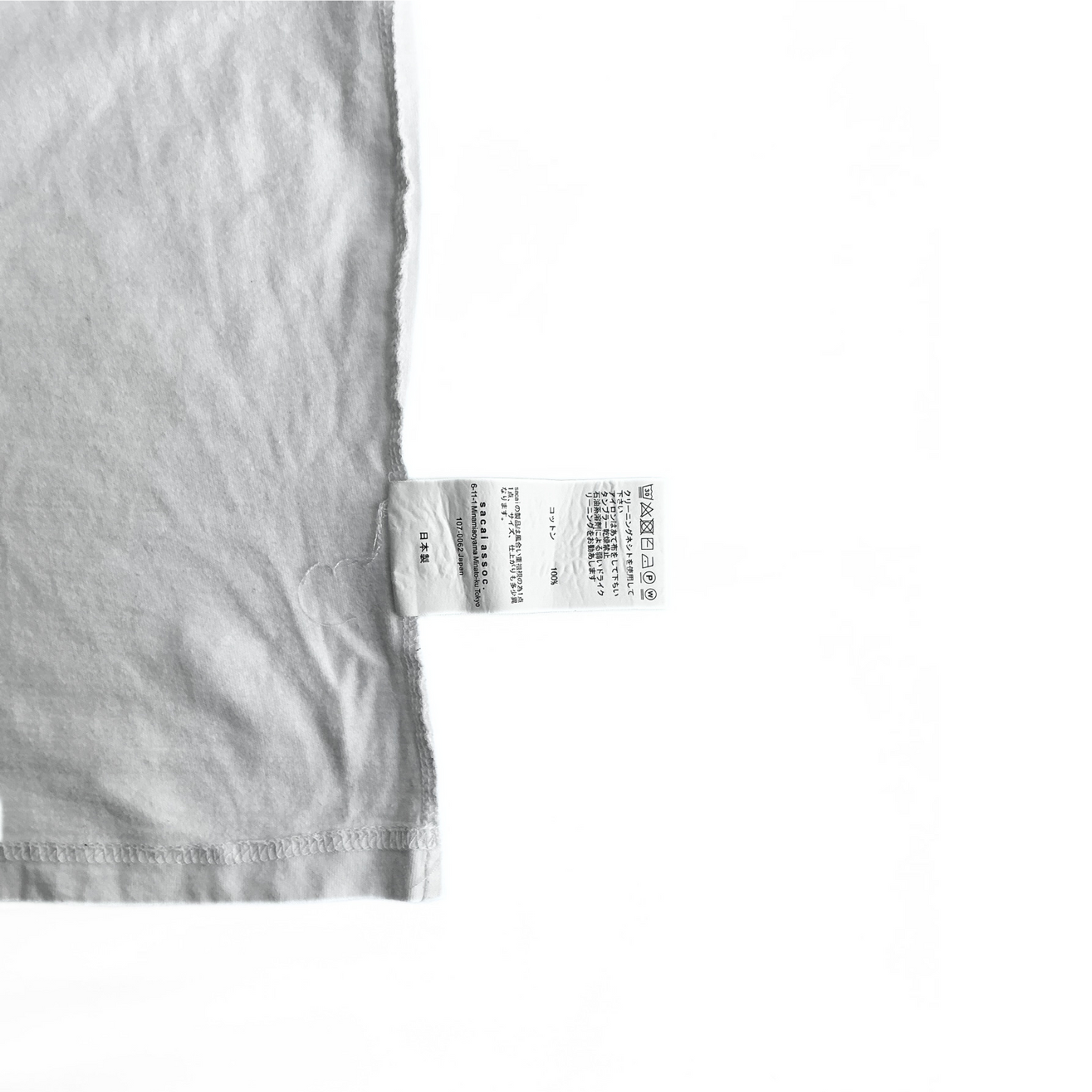 Undefeated Suburst T-Shirt in White Sacai Tag