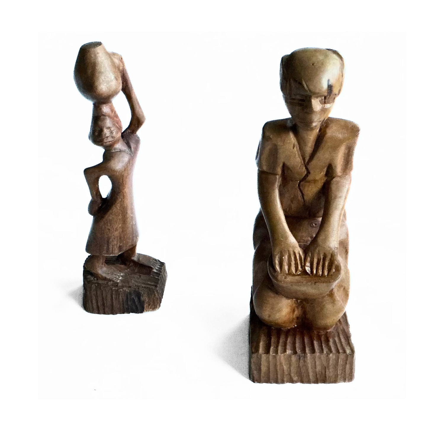A pair of wooden carved African tribal statue. Drummer and basket carrier. 