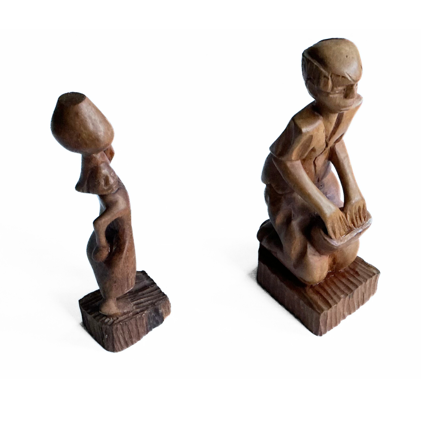 A pair of wooden carved African tribal statue. Drummer and basket carrier. 