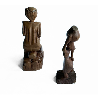 A pair of wooden carved African tribal statue. Drummer and basket carrier. 